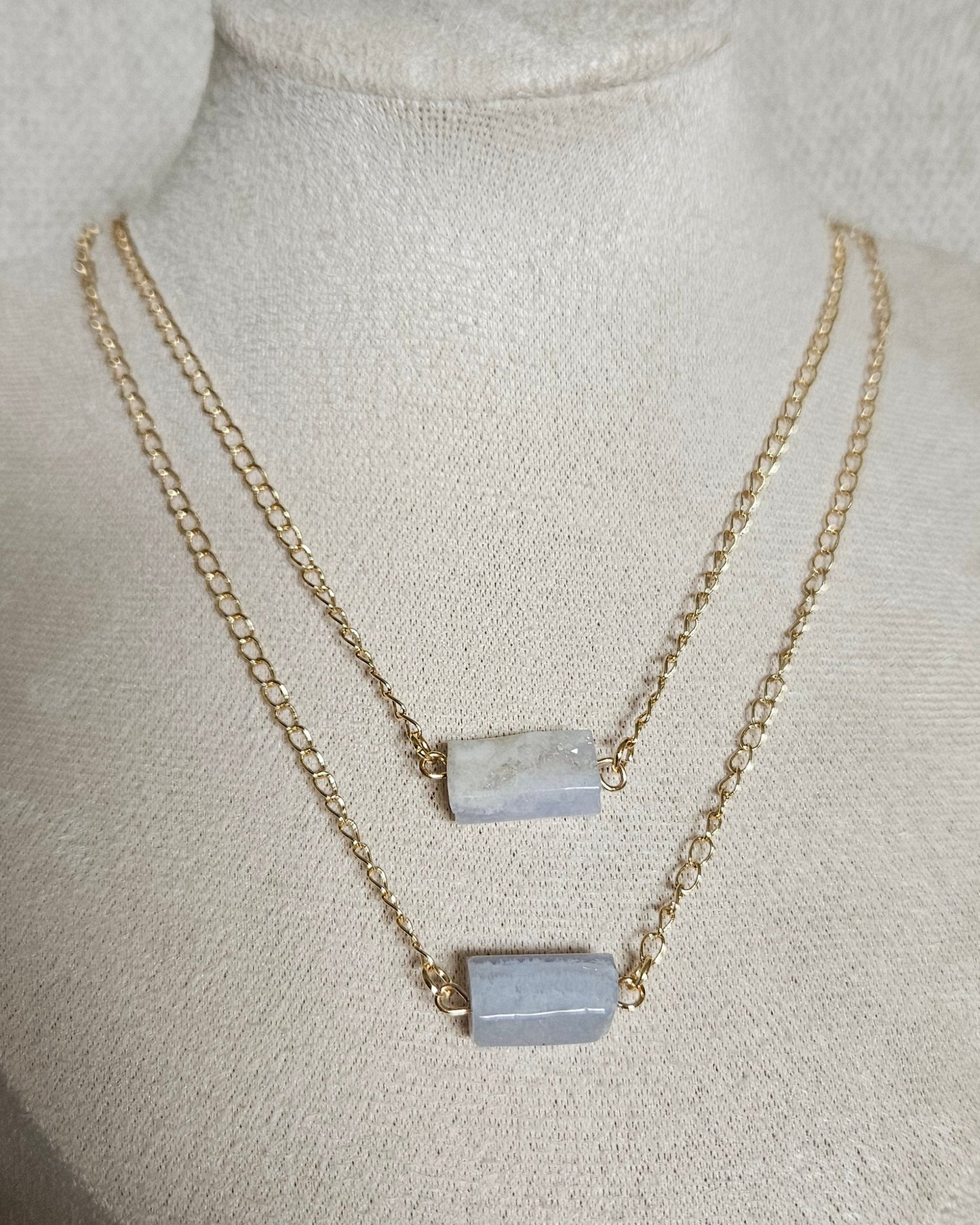 Blue Lace Agate double-chain necklace with two rectangular stones displayed on a beige jewellery bust