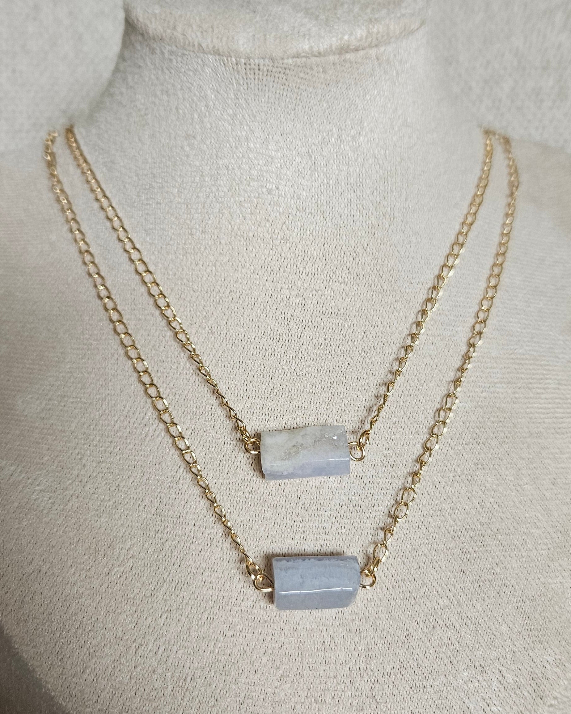 Blue Lace Agate double-chain necklace with two rectangular stones displayed on a beige jewellery bust