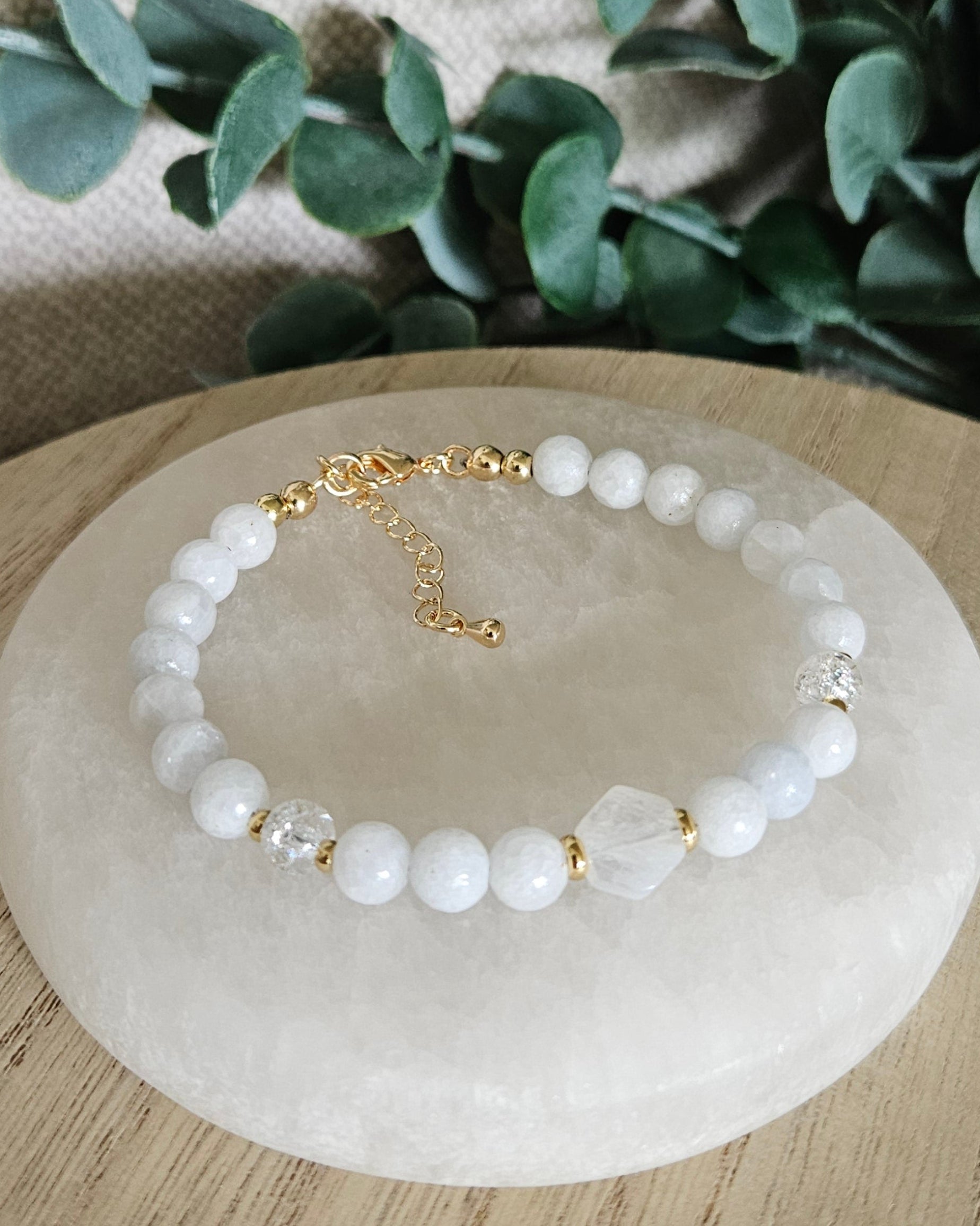 Overhead view of the Celestite, Moonstone and Cracked Quartz bracelet with gold-filled clasp and extender chain