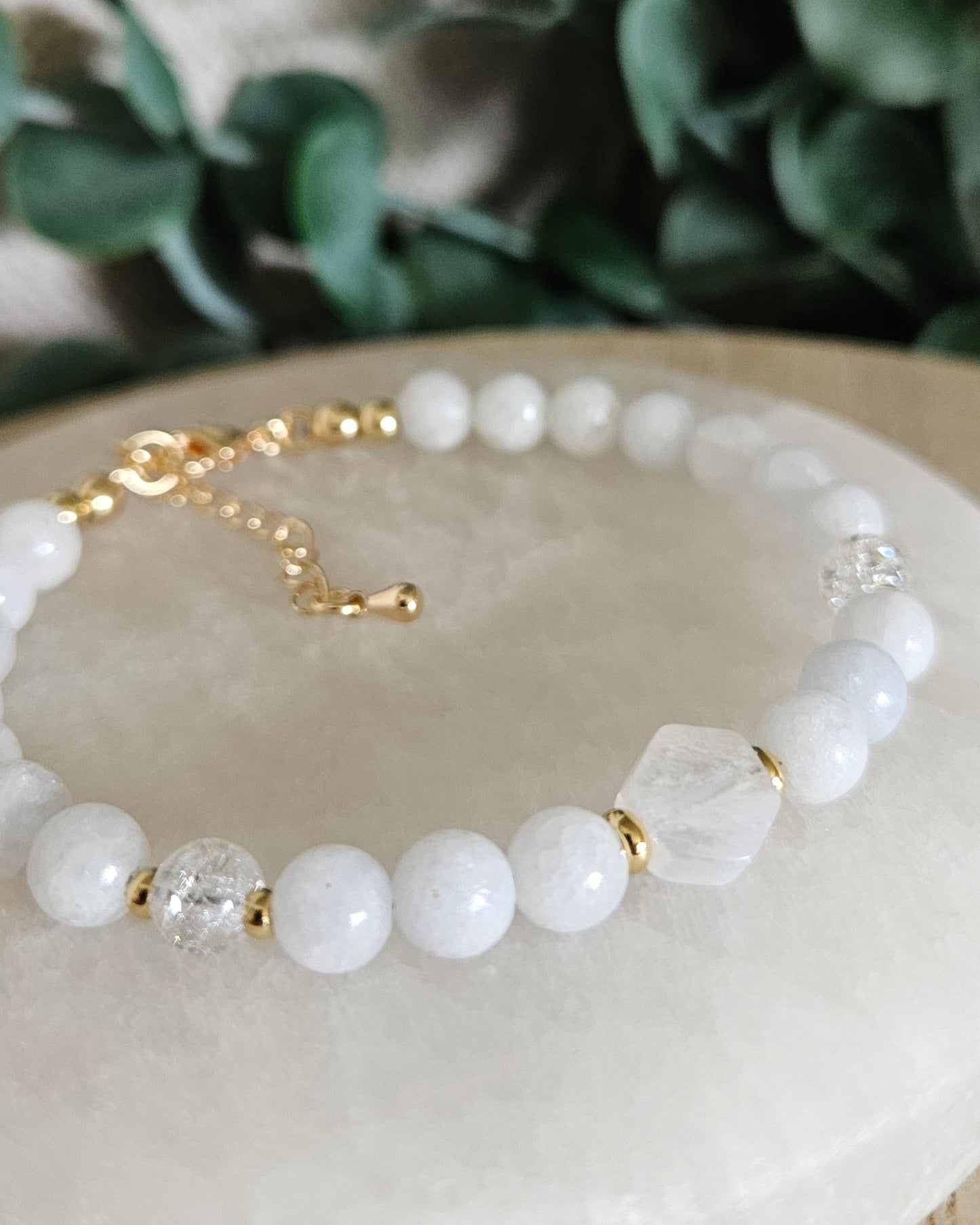 Close-up of the hexagon-cut Moonstone focal, Celestite beads, Cracked Quartz accents and gold details