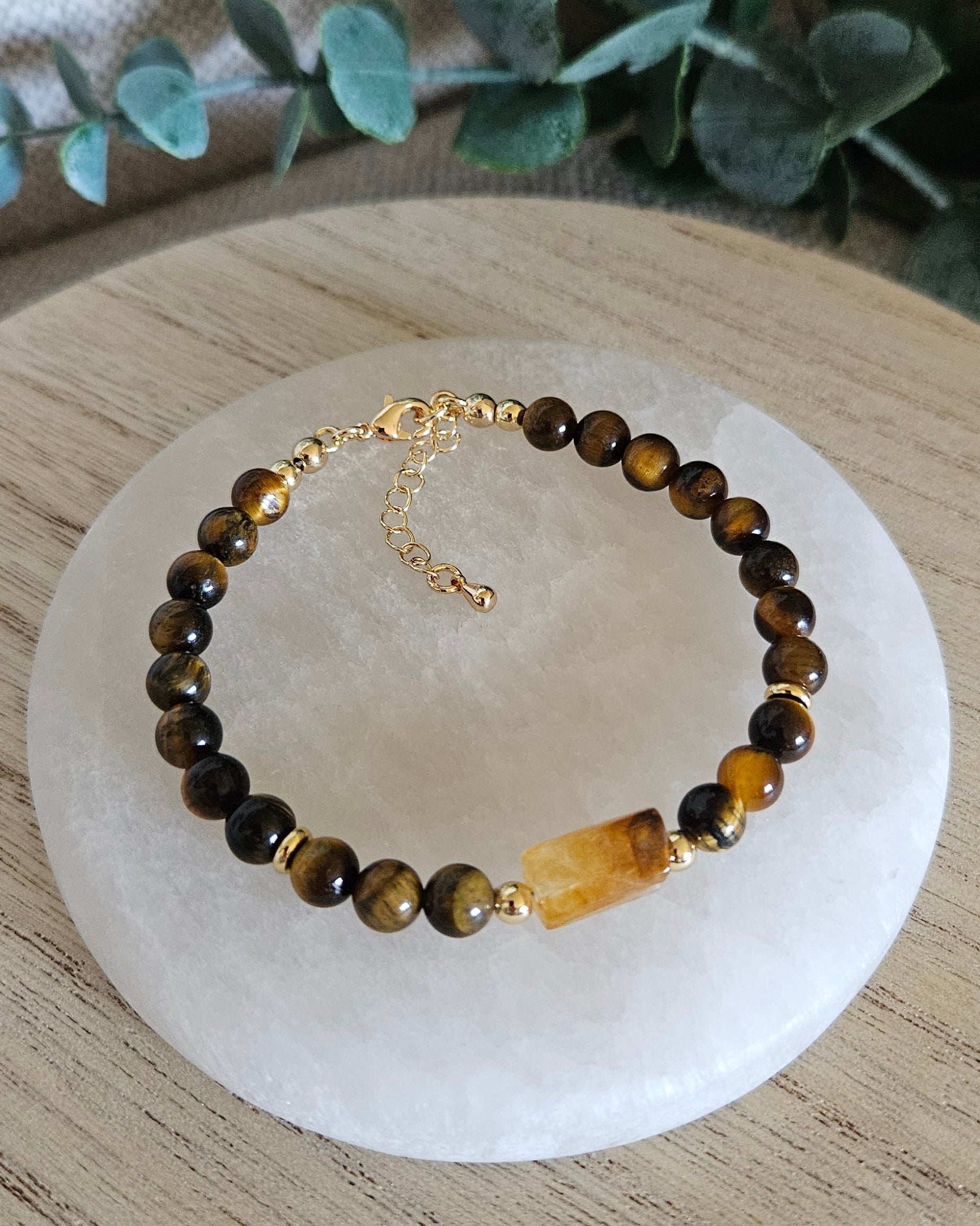 Overhead view of the Tiger’s Eye and Citrine bracelet with gold clasp and extender chain