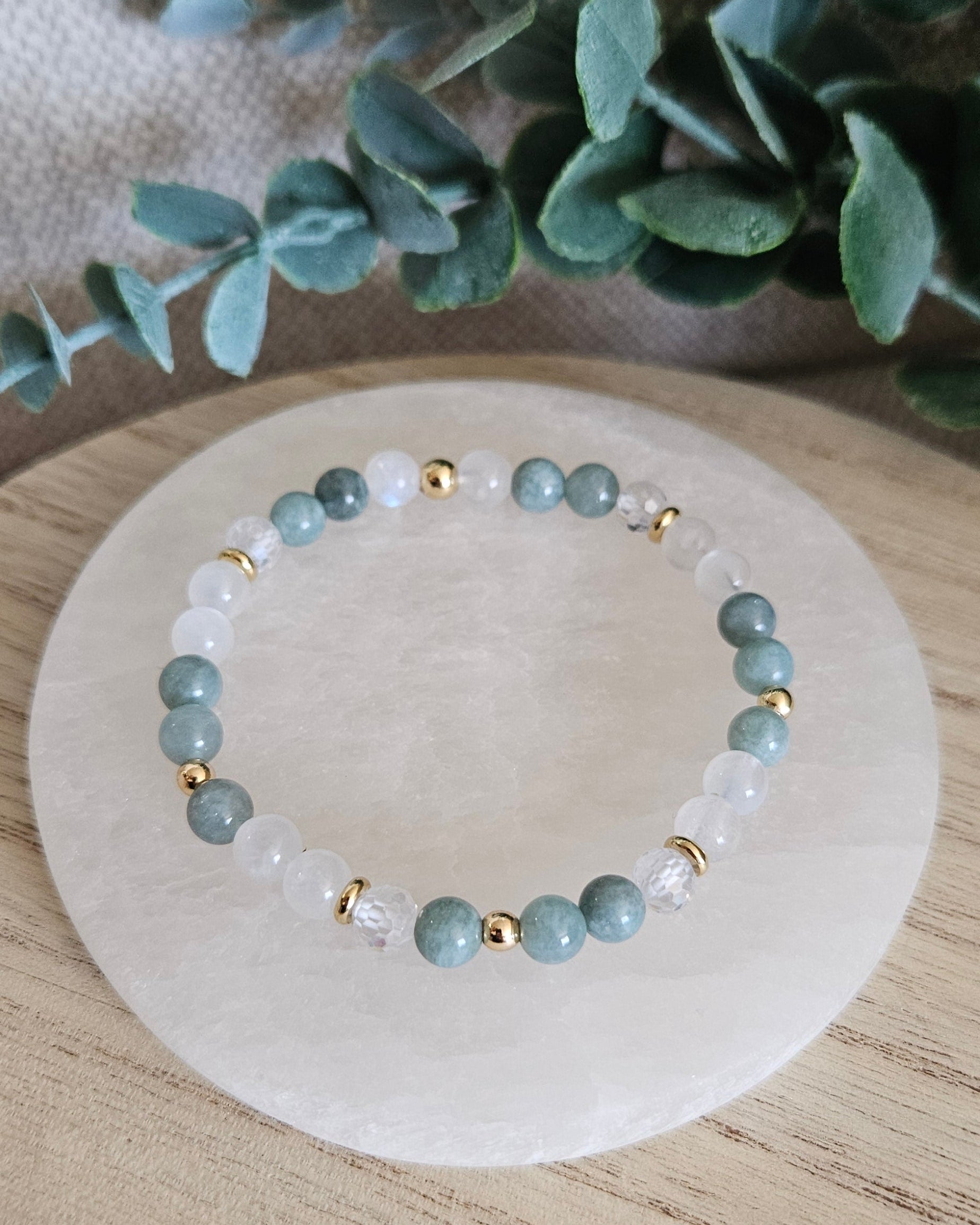 Overhead view of the pale green Jade and white Moonstone bracelet with sparkling Cubic Zirconia detail