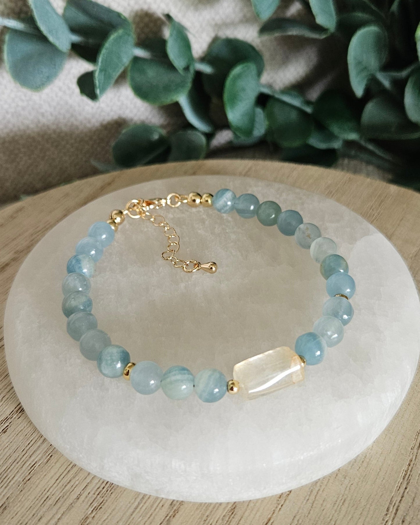 Overhead view of the Blue Calcite and Citrine bracelet with gold-filled clasp and extender chain